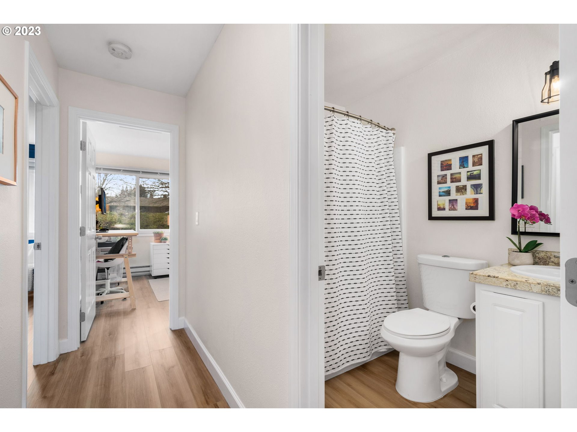 9340 Southwest 146th Terrace, Unit K7 Beaverton, OR 97007 - Photo 10 of 18 a bathroom with a toilet a sink and mirror