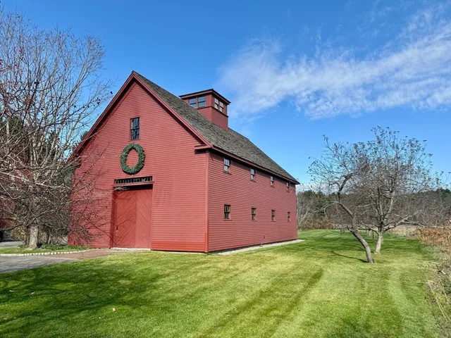 a backyard of a house with lots of green space