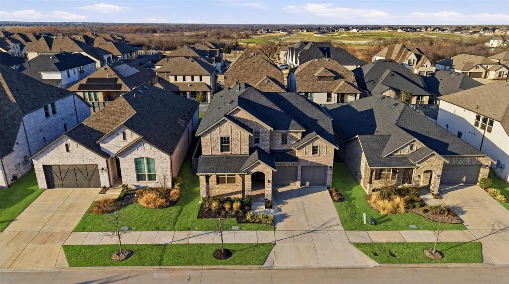537 Oakmoss Street Little Elm, TX 76227 - Photo 29 of 39 an aerial view of a house with a yard