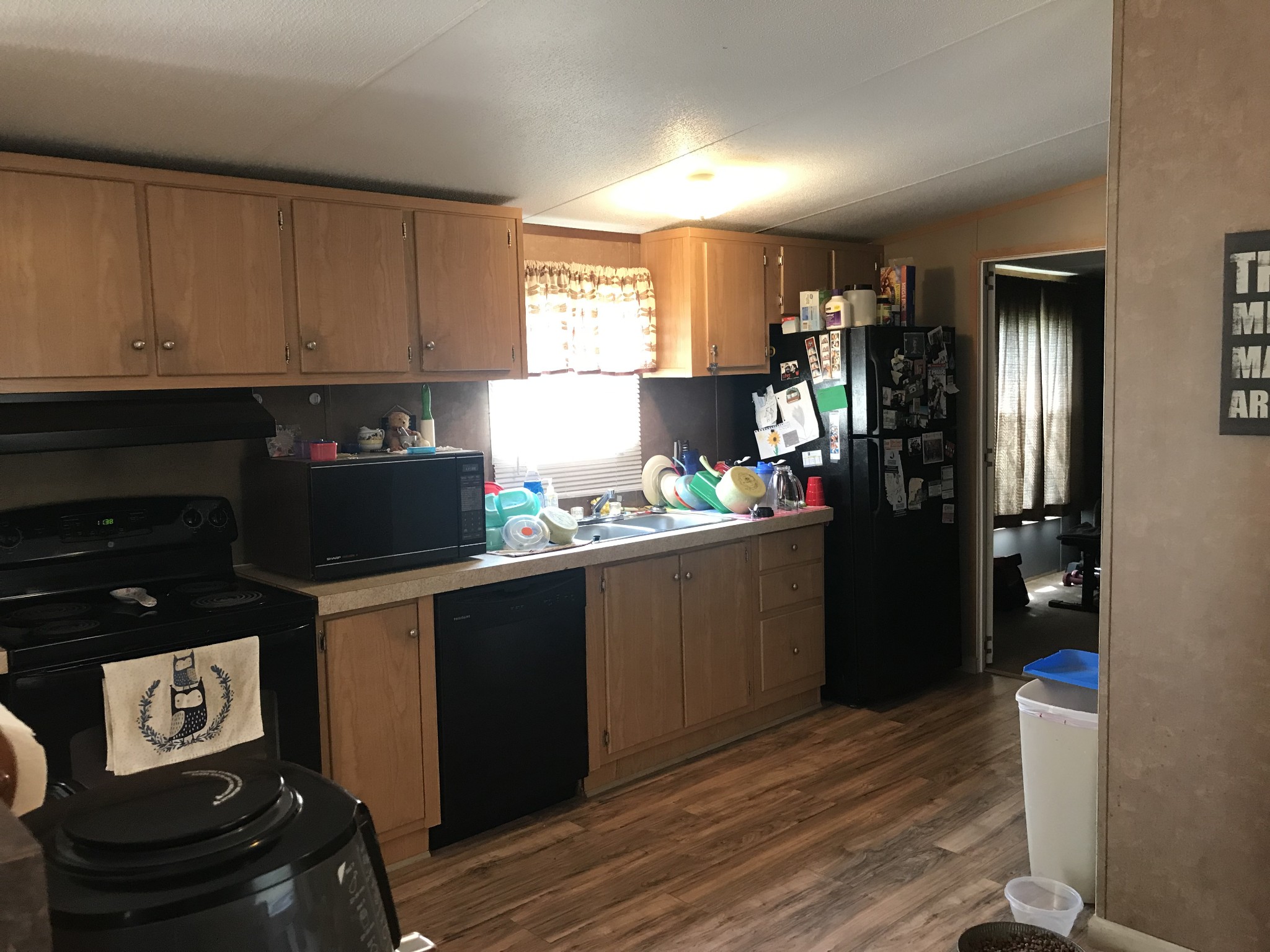 2890 Prospect Road Pulaski, TN 38478 - Photo 15 of 29 a kitchen with granite countertop a refrigerator stove top oven and sink