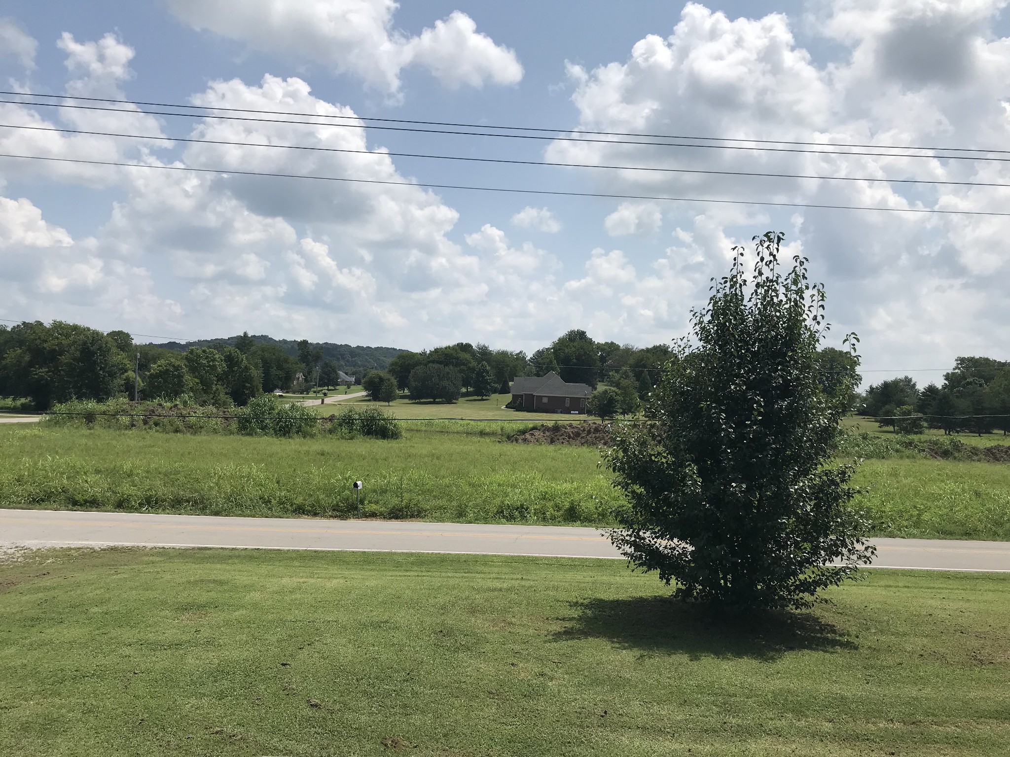 2890 Prospect Road Pulaski, TN 38478 - Photo 3 of 29 a view of a golf course with a lake