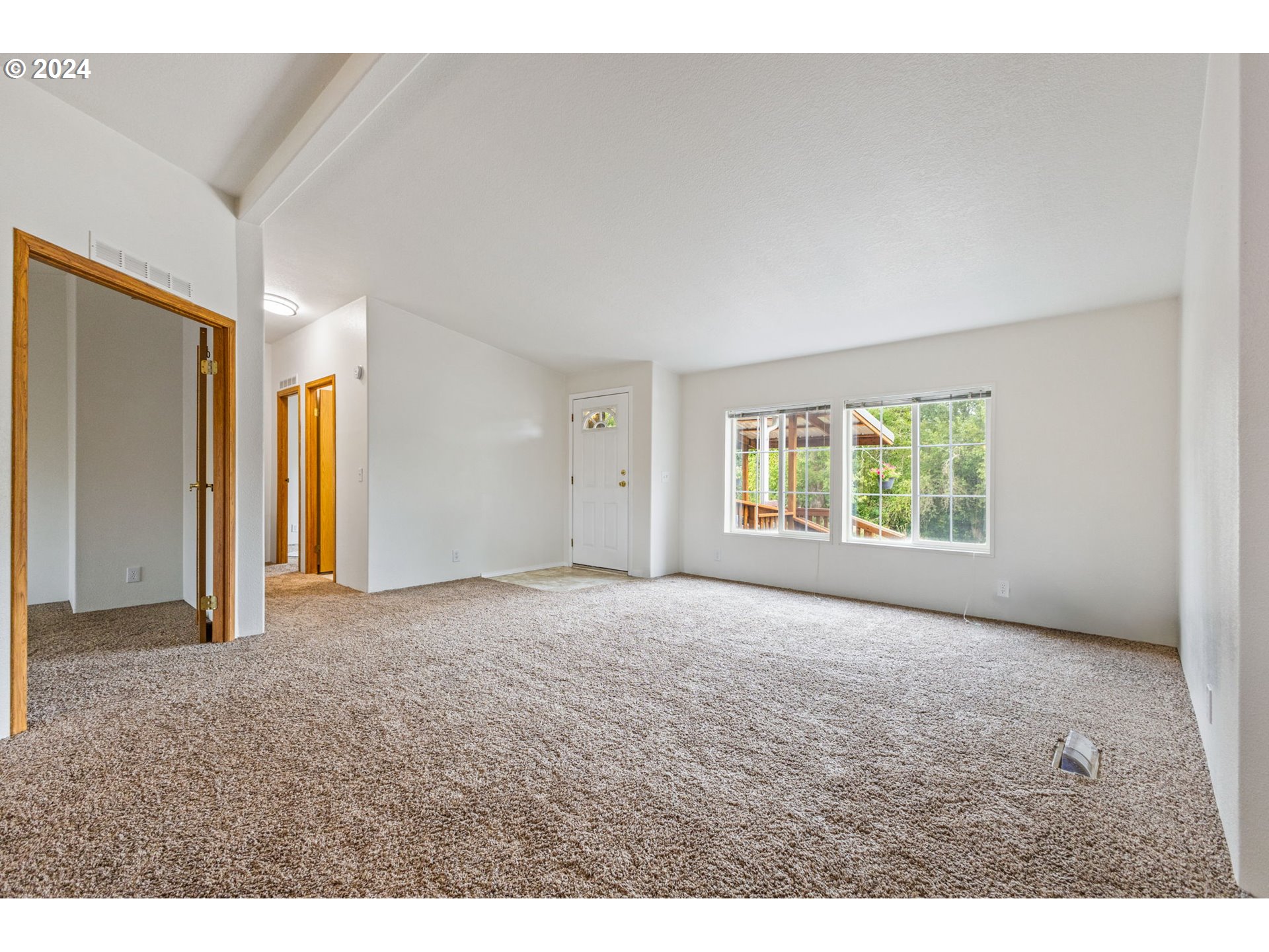 34264 East Lacomb Road Lebanon, OR 97355 - Photo 8 of 32 a view of an empty room with a window