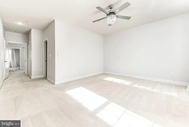 a view of a big room with carpet