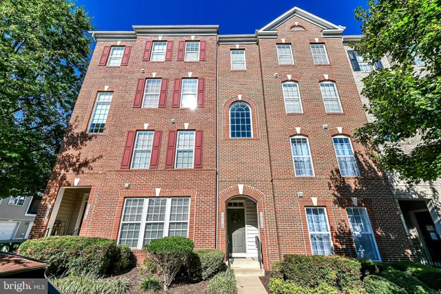 a city street lined with buildings and cars