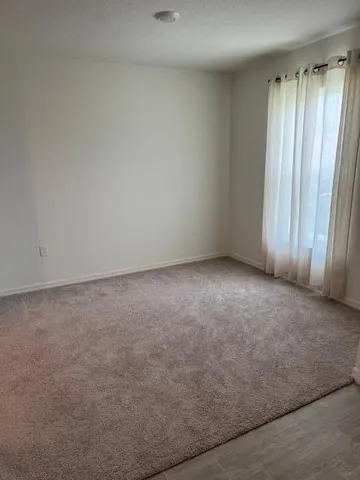 an empty room with window