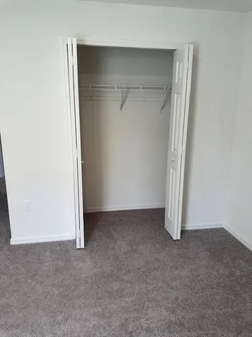an empty room with closet