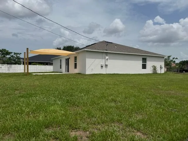 a front view of house with yard