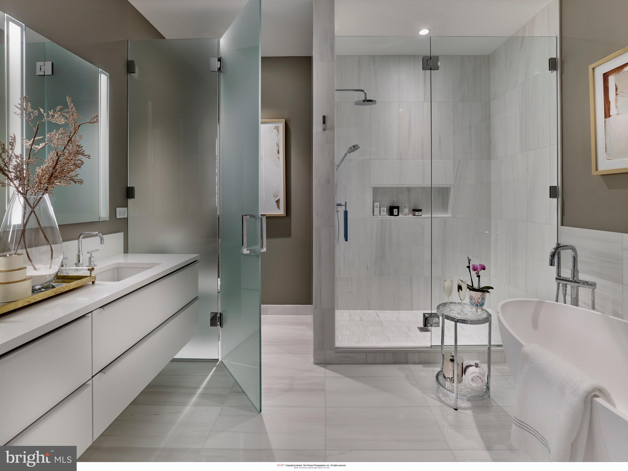 301 South Broad Street, Unit 2202 Philadelphia, PA 19107 - Photo 14 of 28 Owner's bath has floating double quartz vanity