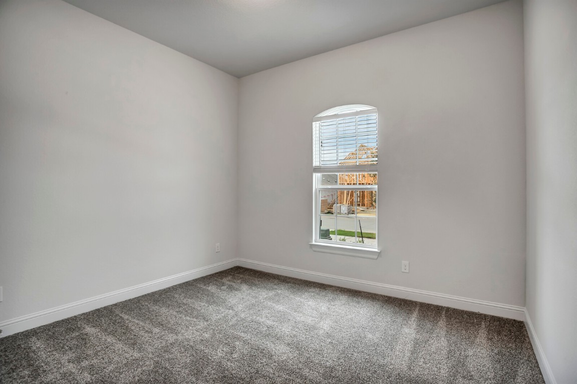2313 Base Burner Path Leander, TX 78641 - Photo 6 of 26 an empty room with a window