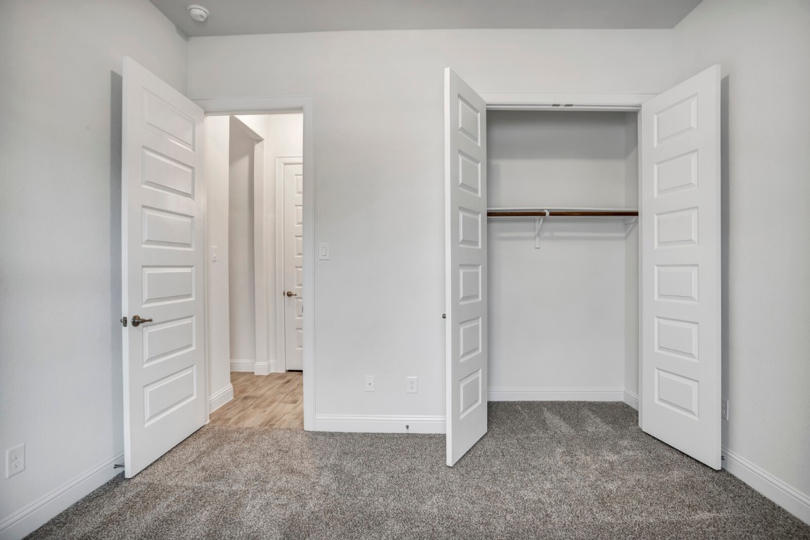 2313 Base Burner Path Leander, TX 78641 - Photo 7 of 26 an empty room with closet