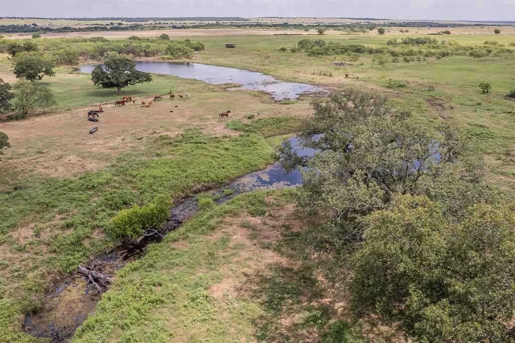 495 Lyles Road Henrietta, TX 76365 - Photo 7 of 18 Drone / aerial view featuring a water view