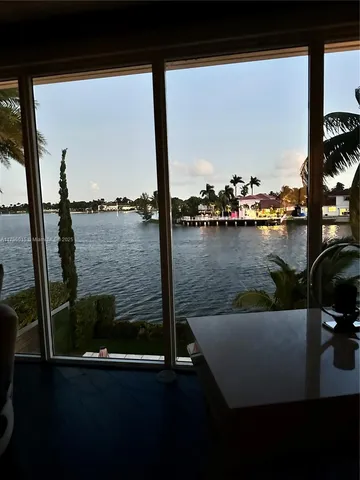 a view of a lake from a balcony