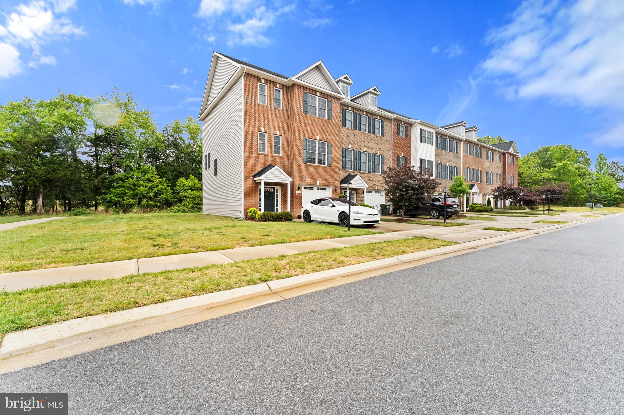 982 Rye Drive La Plata, MD 20646 - Photo 2 of 42 Row of brick townhomes on quiet street