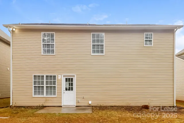 a picture of a book and a white wall