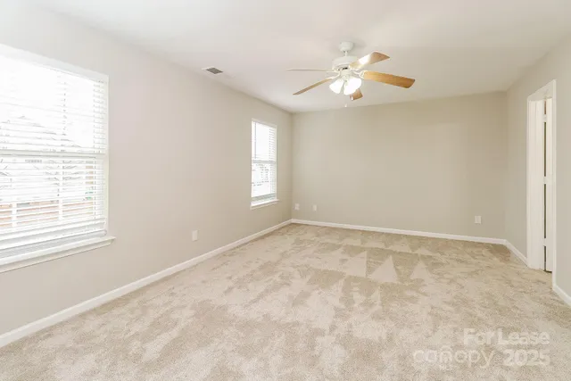 a bathroom with a sink toilet and vanity