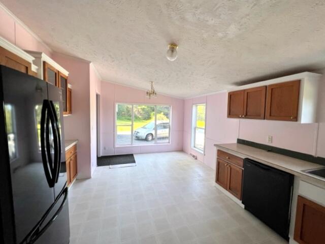 385 Village Road Jackson, ME 04921 - Photo 4 of 24 Dining Room with Large Windows