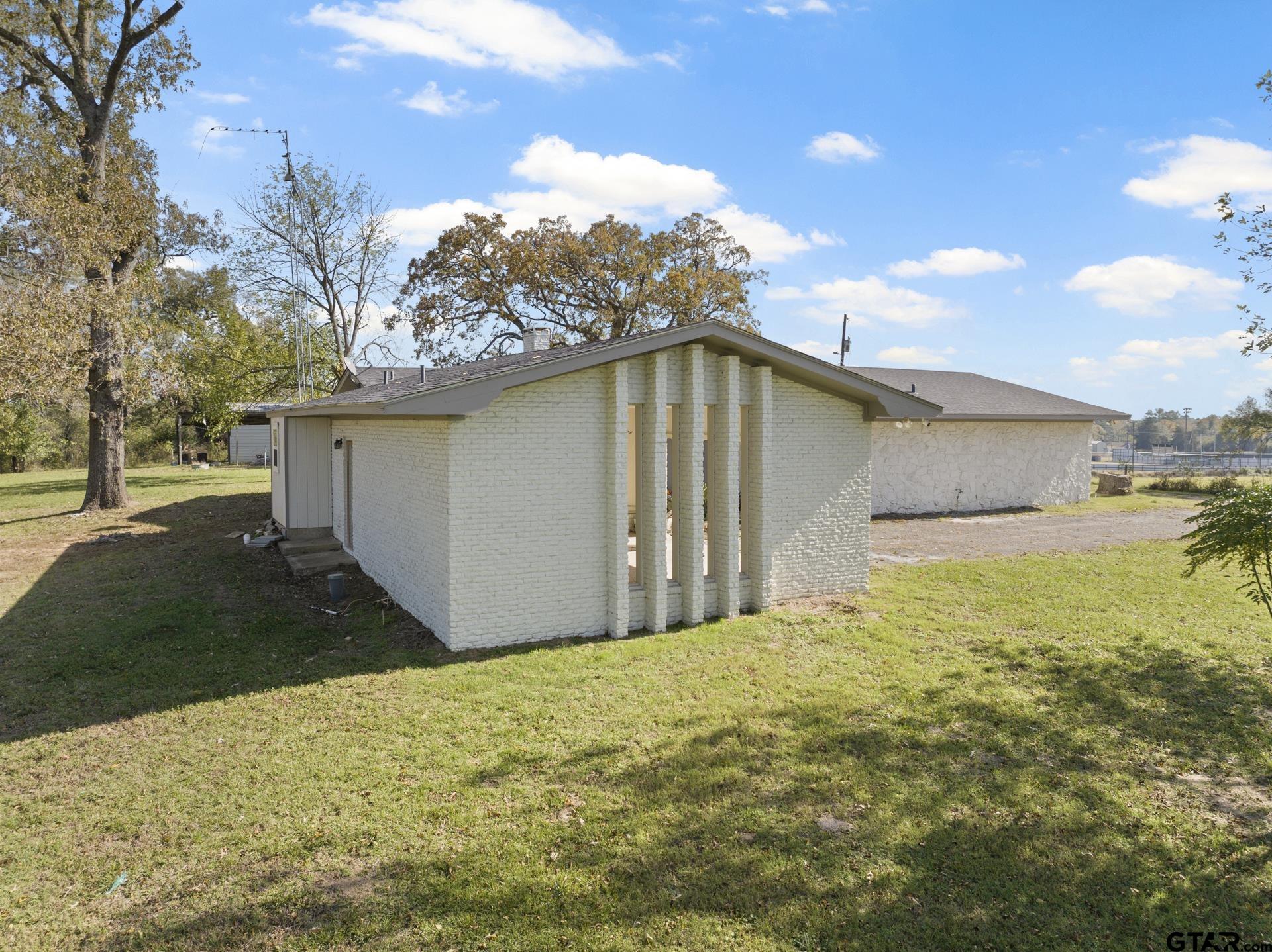 331 County Road 2106 Pittsburg, TX 75686 - Photo 17 of 32 a house view with a outdoor space