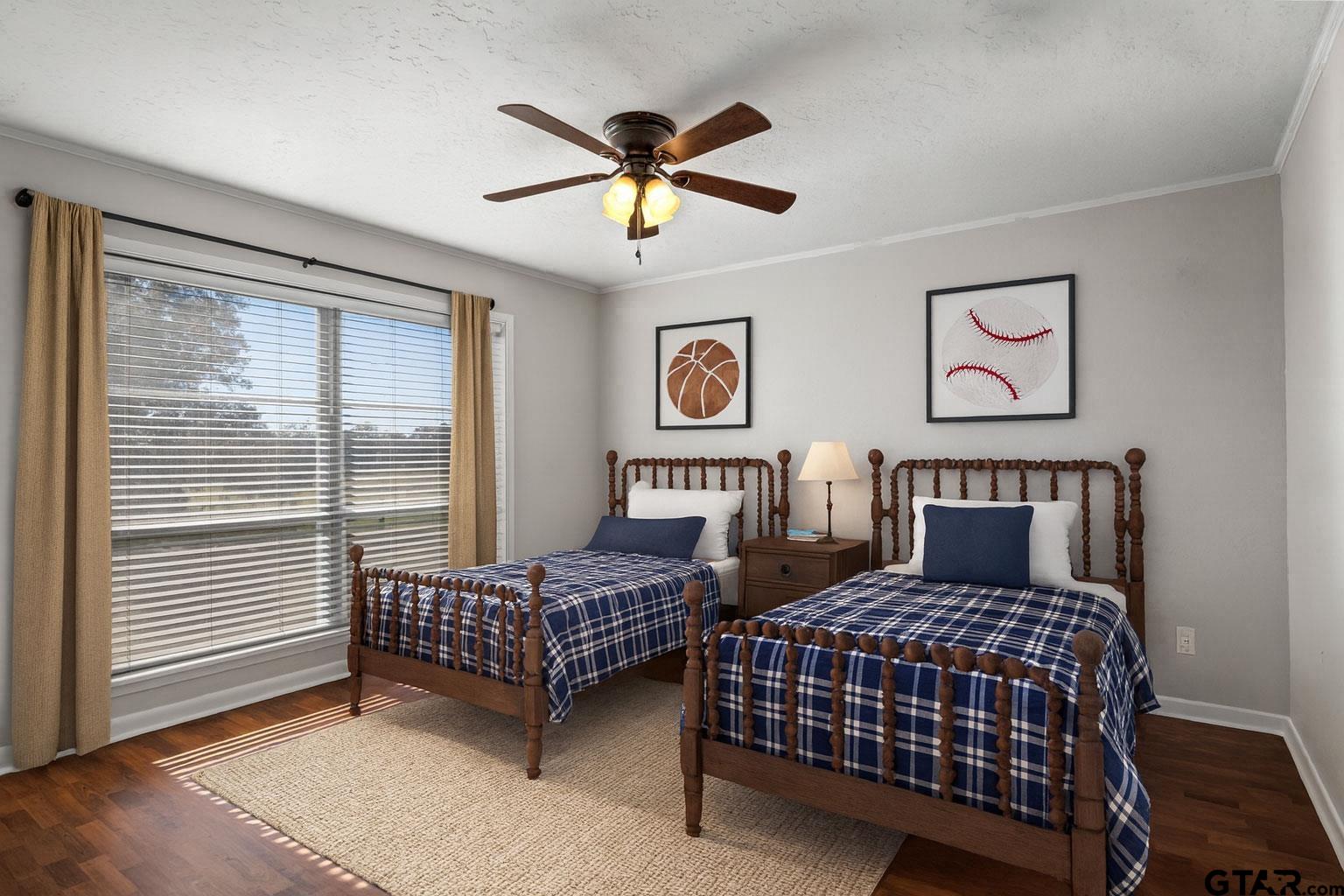 331 County Road 2106 Pittsburg, TX 75686 - Photo 28 of 32 a bedroom with two beds and windows