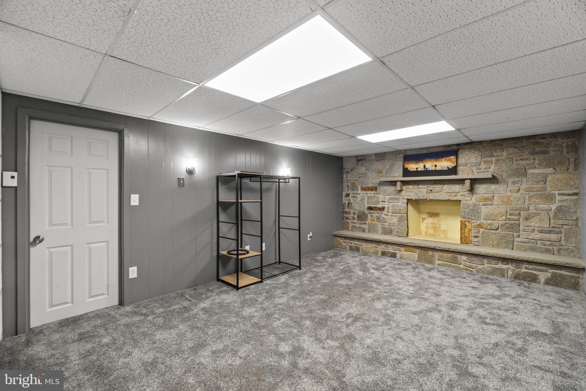 2401 Albert Rill Road Hampstead, MD 21074 - Photo 21 of 38 an empty room with a empty space and windows