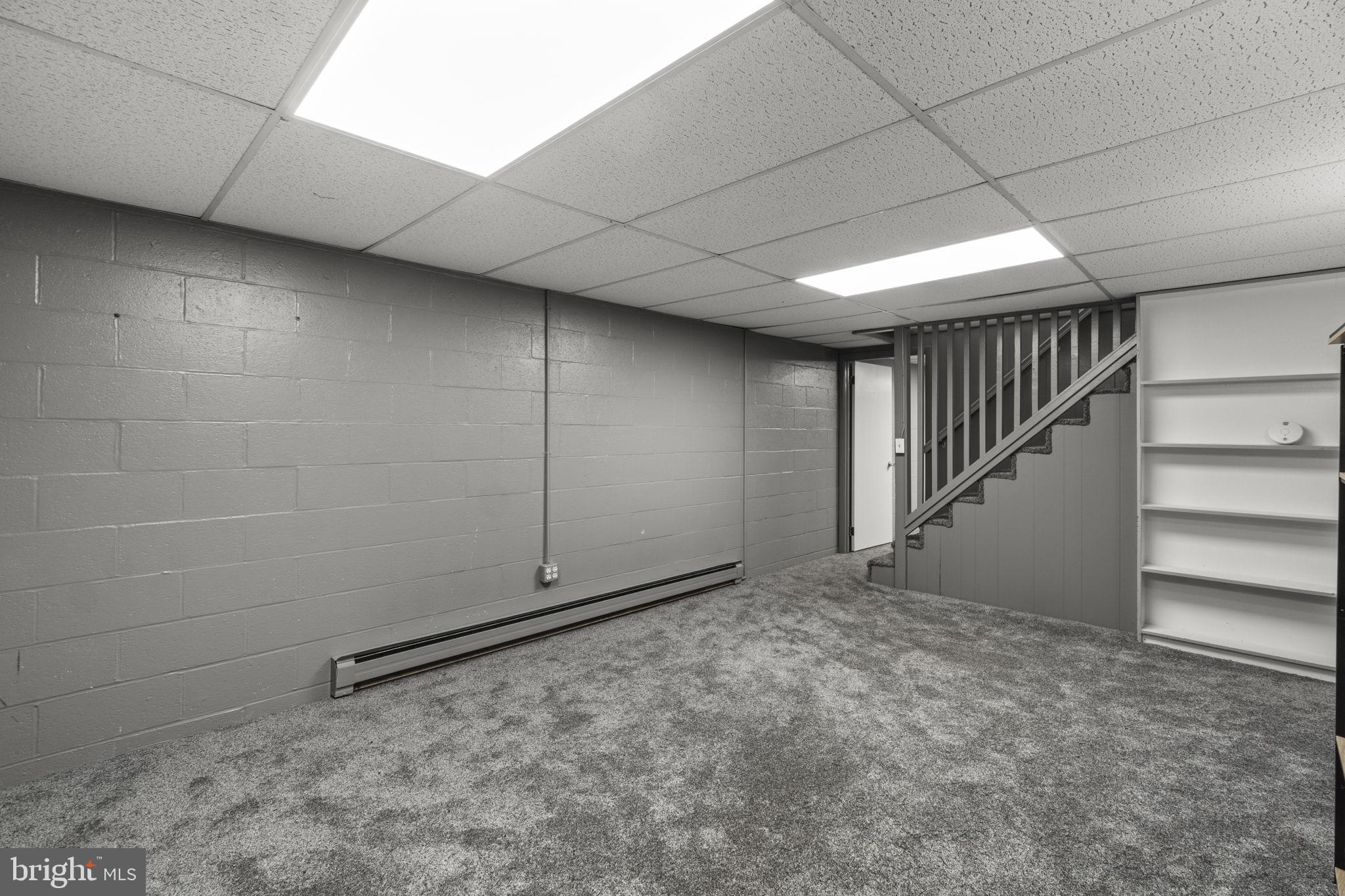 2401 Albert Rill Road Hampstead, MD 21074 - Photo 23 of 38 a view of an empty room with stairs