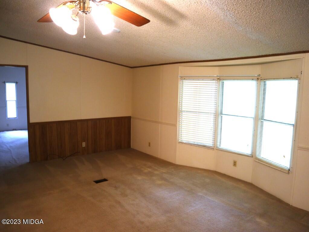 2560 Bonner Gilbert Road Lizella, GA 31052 - Photo 3 of 23 a view of an empty room with a window