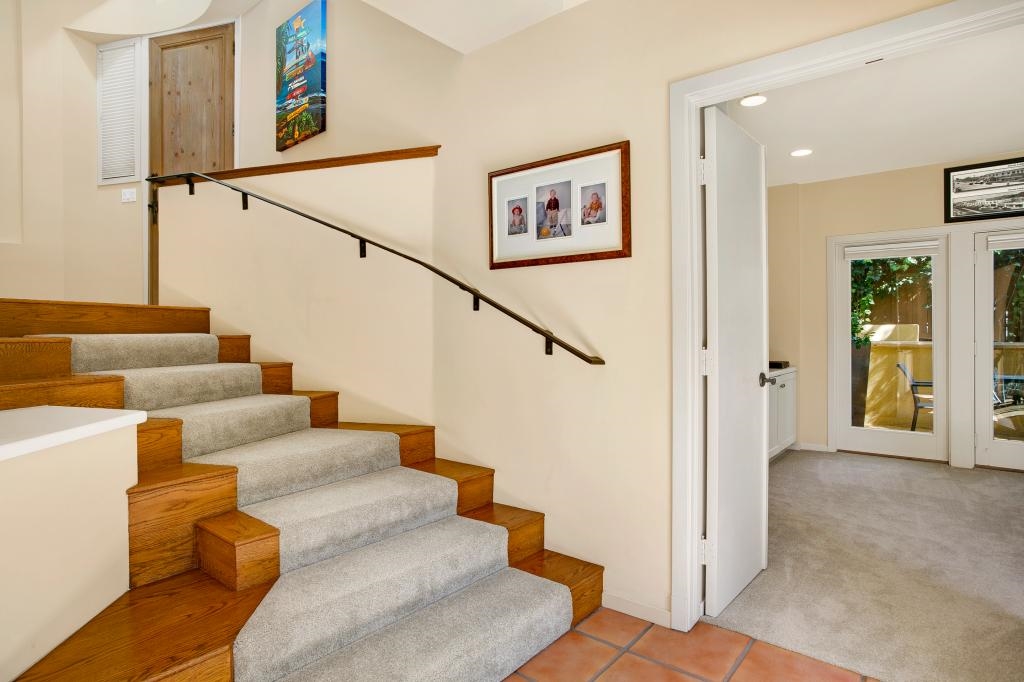 234 3rd Street Encinitas, CA 92024 - Photo 19 of 25 Stairs to lower level with 3 spacious bedrooms and 2 bathrooms.