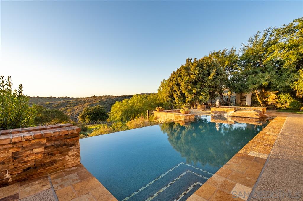 18668 Via Catania Rancho Santa Fe, CA 92091 - Photo 16 of 25 a view of a lake with a mountain