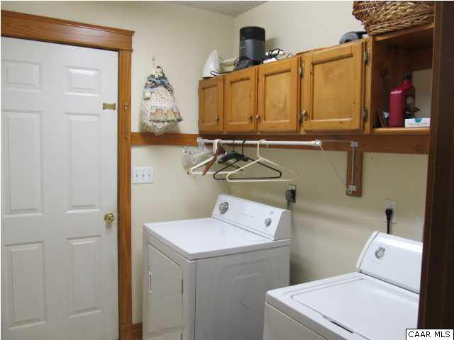 10 Colonial Road Palmyra, VA 22963 - Photo 3 of 27 a bathroom with a sink a toilet and shower