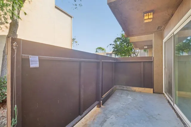 a view of a house with a tree