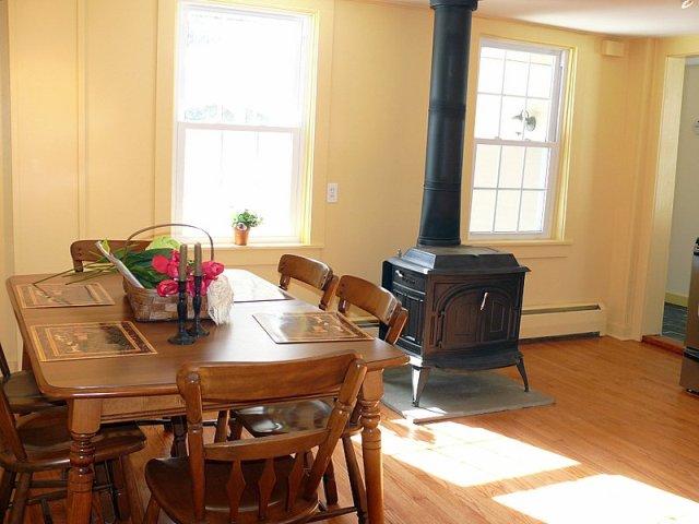 2619 Hancock Road Hancock, MA 01267 - Photo 5 of 16 a view of a dining room with furniture and chandelier