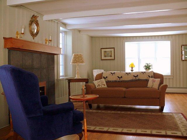 2619 Hancock Road Hancock, MA 01267 - Photo 6 of 16 a living room with furniture and a fireplace
