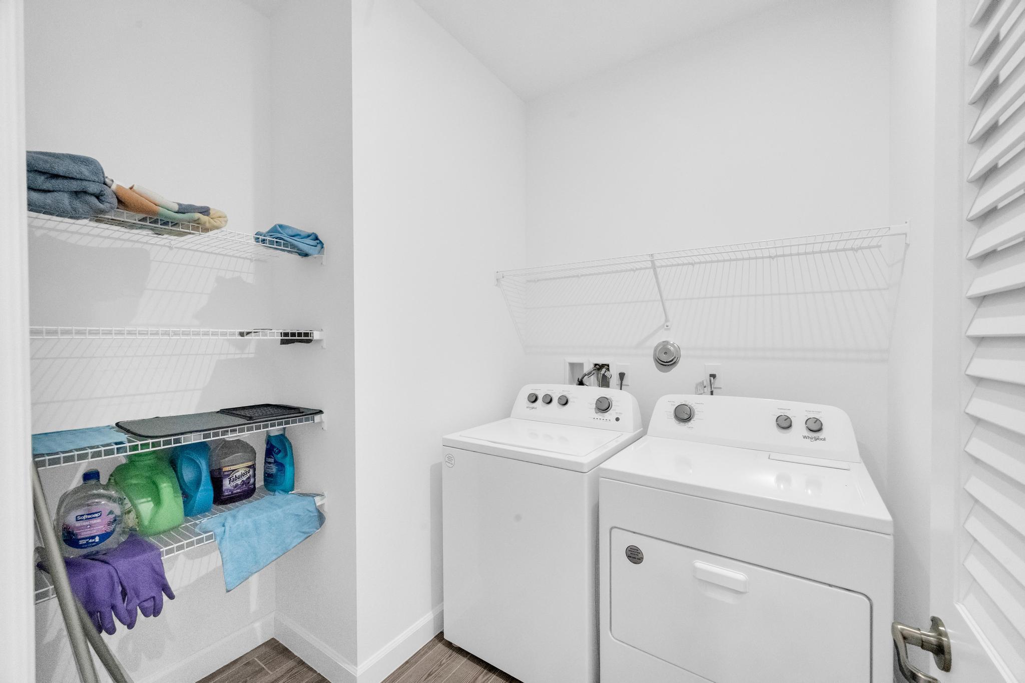 9060 Remy Lane Port St. Lucie, FL 34987 - Photo 15 of 33 a utility room with dryer and washer