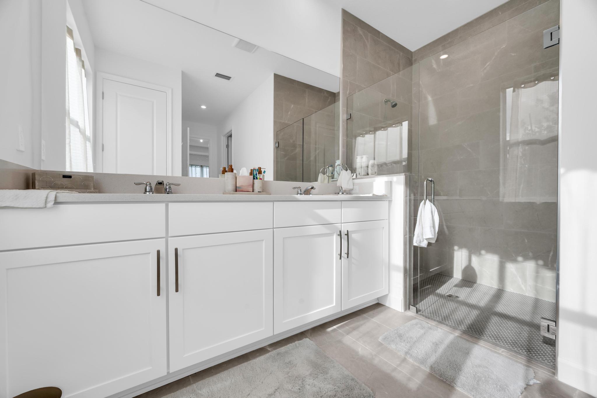 9060 Remy Lane Port St. Lucie, FL 34987 - Photo 25 of 33 a kitchen with sink and cabinets