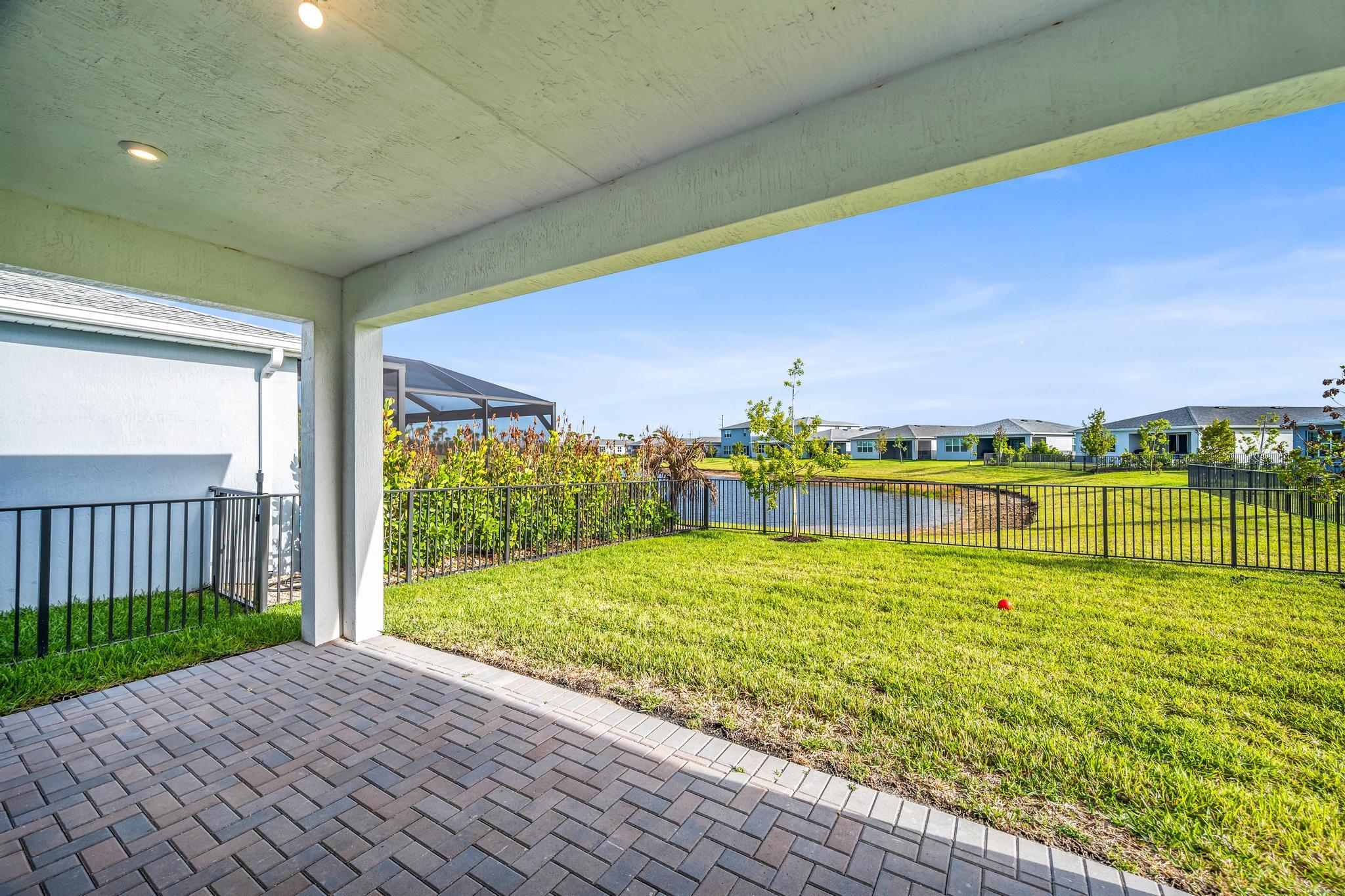 9060 Remy Lane Port St. Lucie, FL 34987 - Photo 30 of 33 a view of an swimming pool and outdoor space