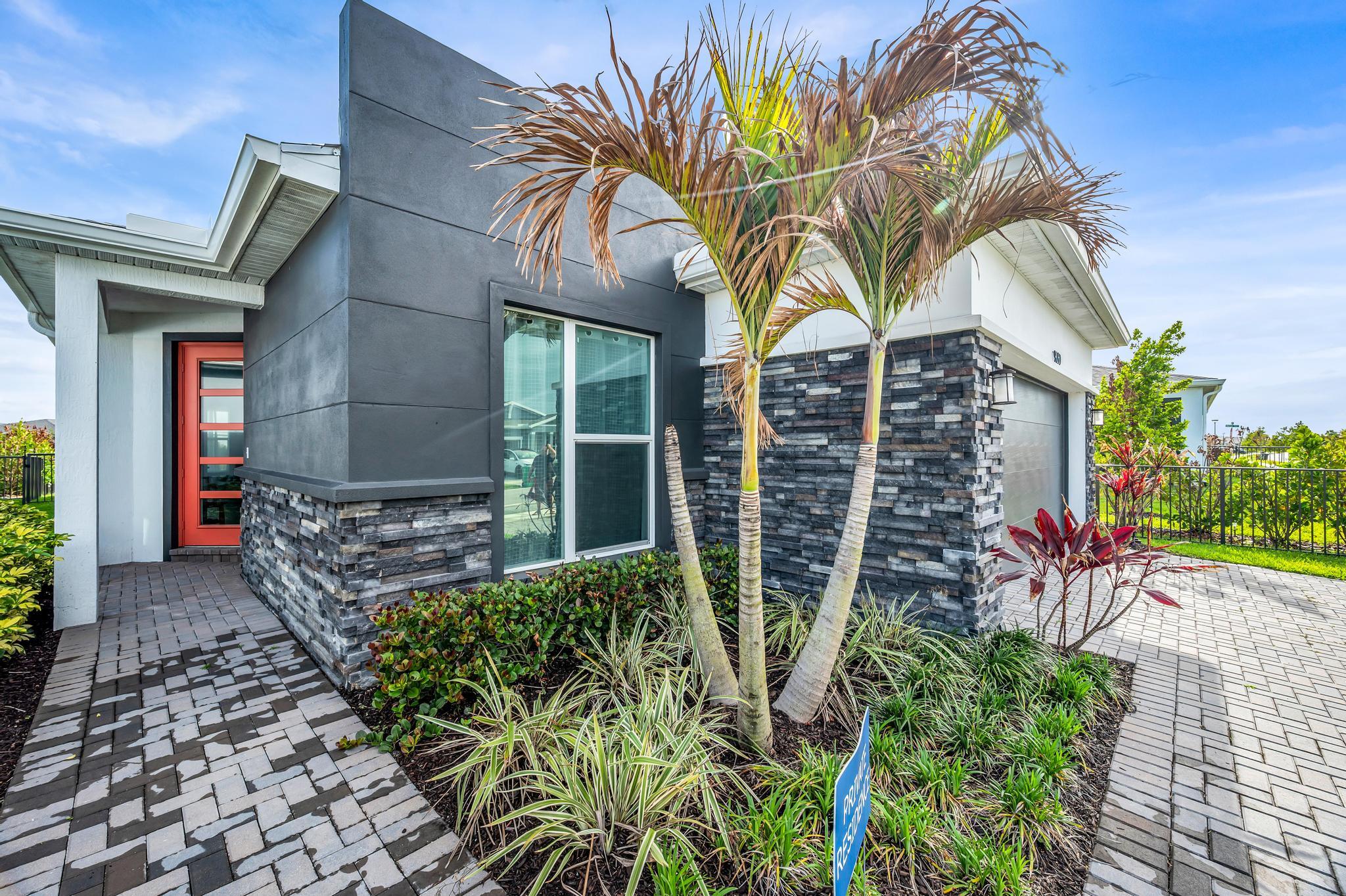 9060 Remy Lane Port St. Lucie, FL 34987 - Photo 3 of 33 front view of a house