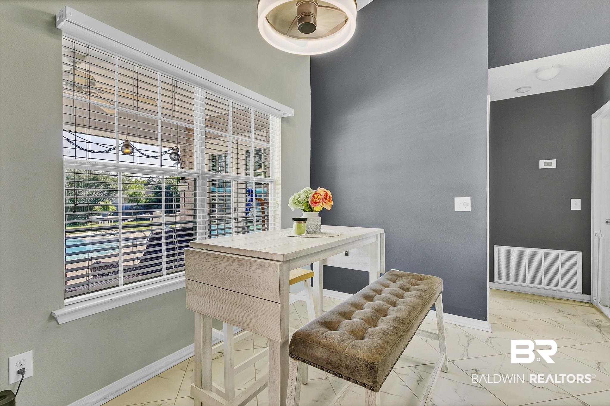 16358 Tempest Drive Foley, AL 36535 - Photo 16 of 46 Dining room with baseboards, visible vents, and marble finish floor