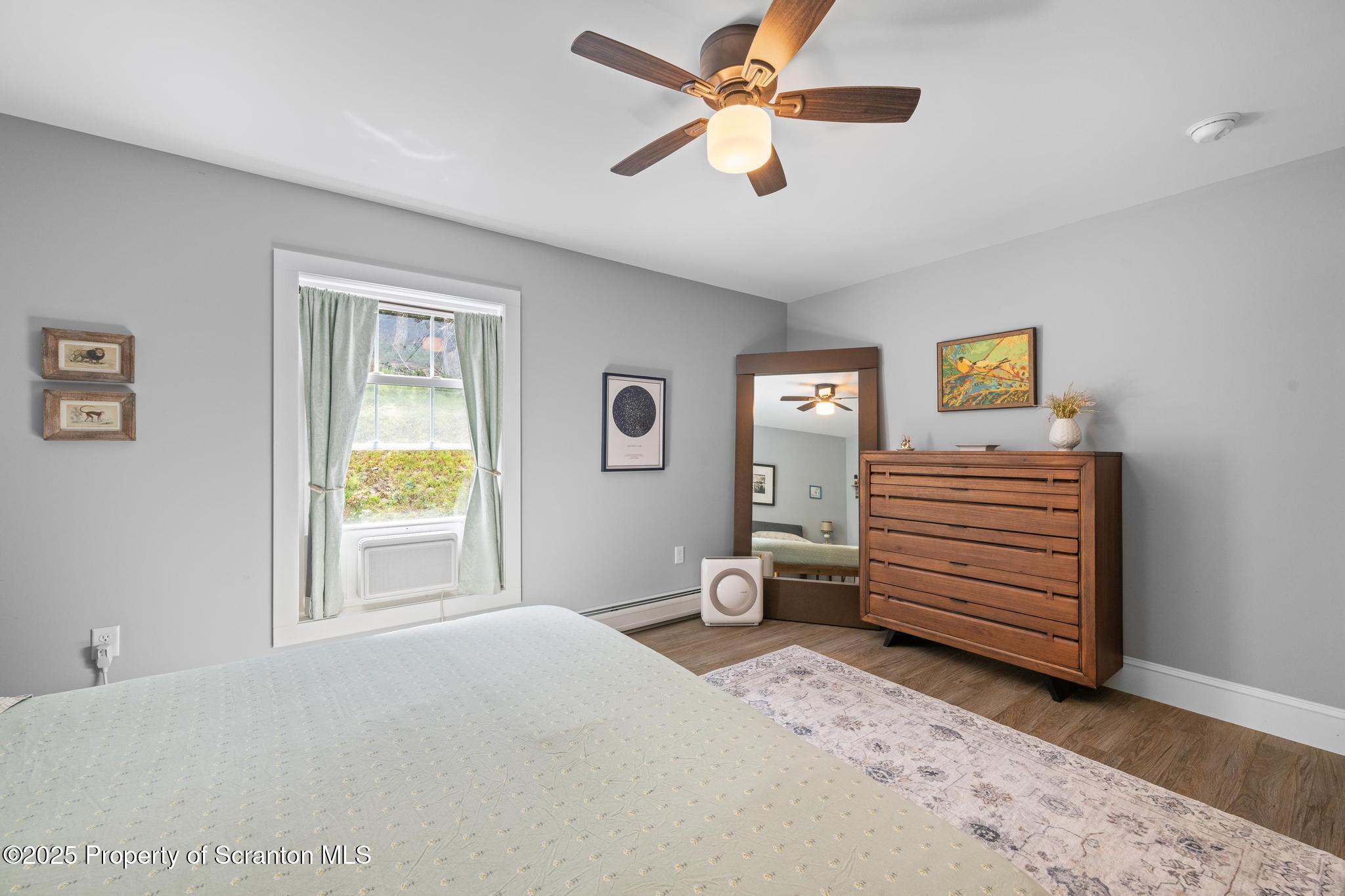 300 Gumbletown Road Paupack, PA 18451 - Photo 25 of 46 a bedroom with a bed and a window