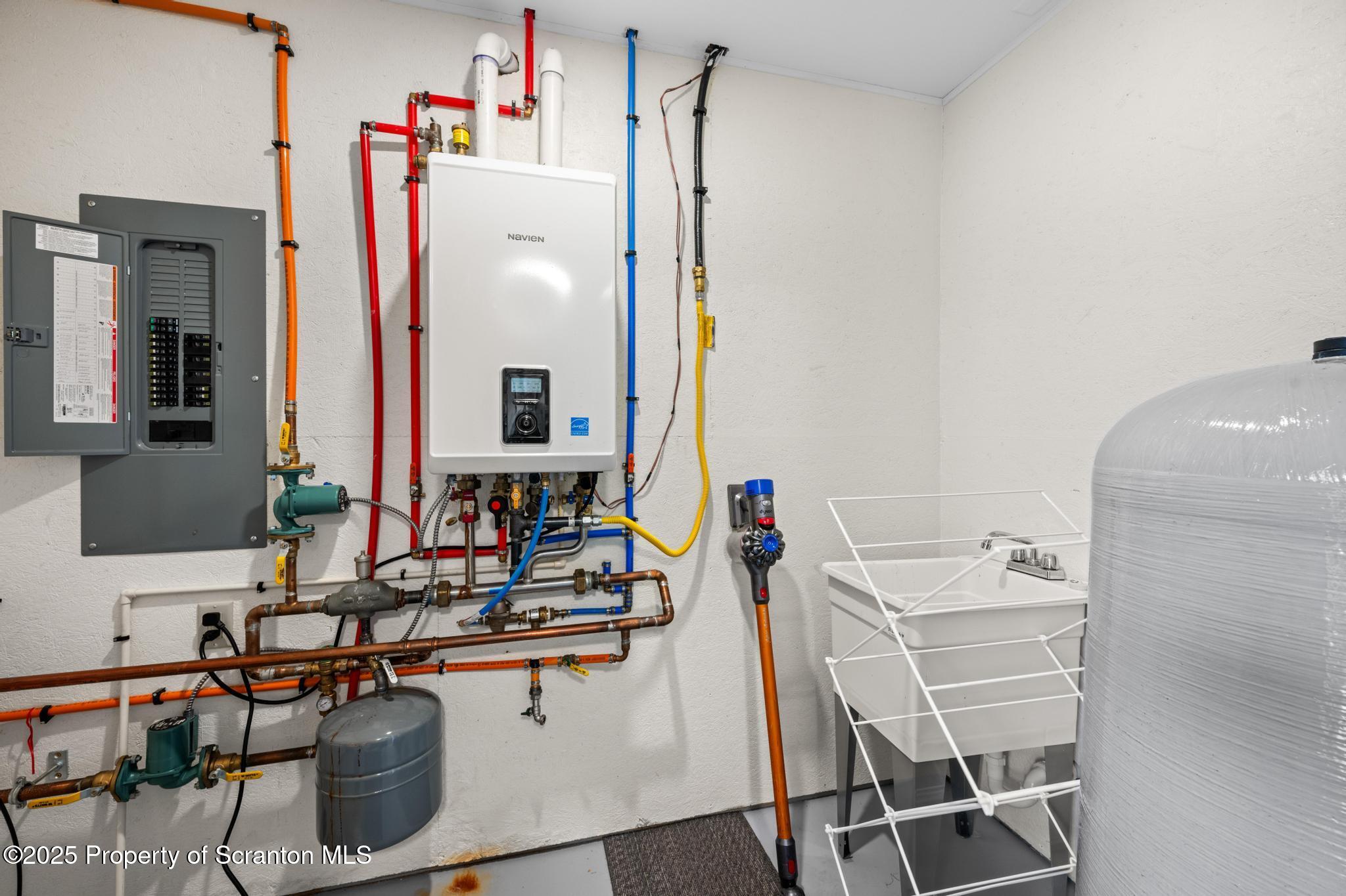 300 Gumbletown Road Paupack, PA 18451 - Photo 29 of 46 a bathroom with a sink and a mirror