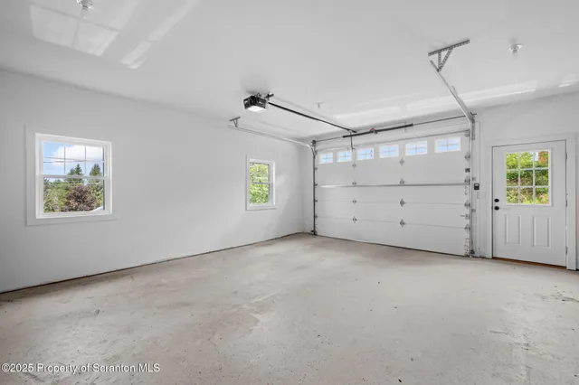 a view of a room with window and windows