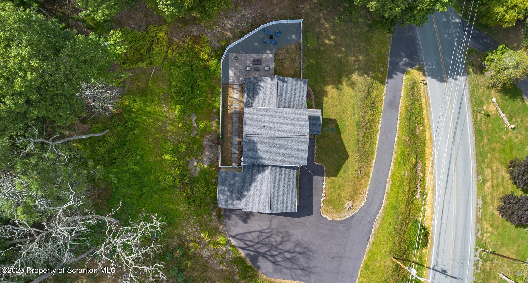300 Gumbletown Road Paupack, PA 18451 - Photo 35 of 46 a aerial view of a house with a garden