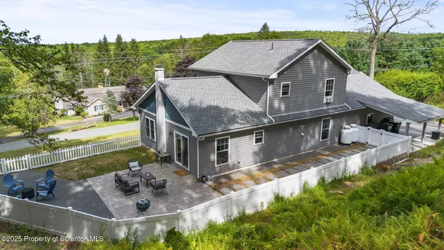 a house with river in front of it