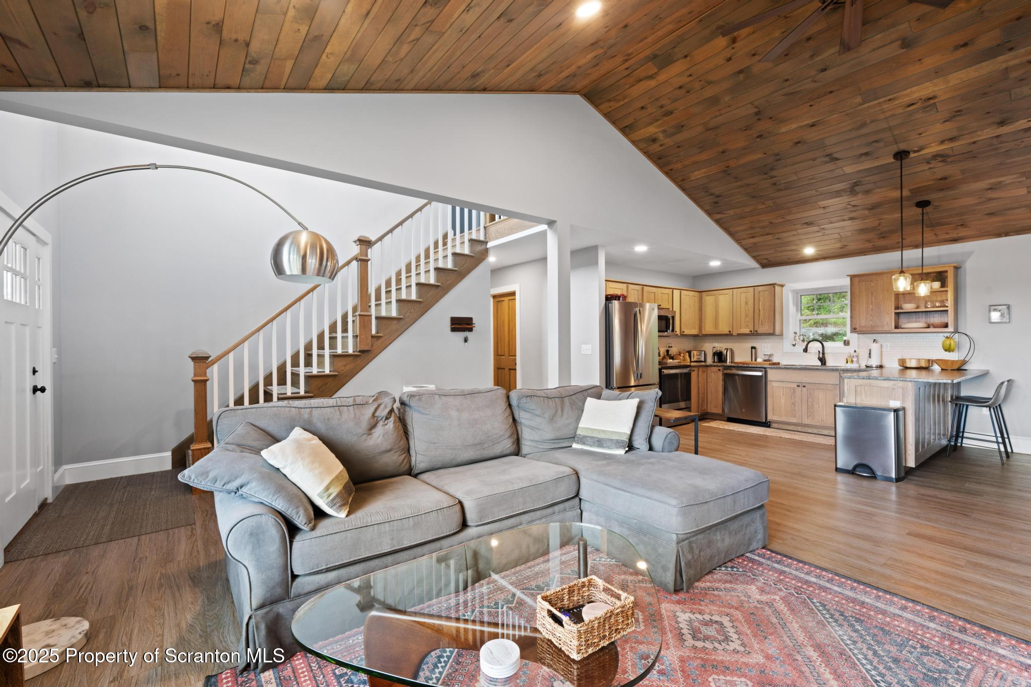 300 Gumbletown Road Paupack, PA 18451 - Photo 4 of 46 a living room with furniture and wooden floor