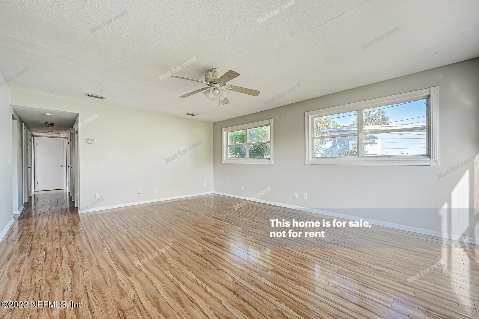 10918 Java Drive Jacksonville, FL 32246 - Photo 18 of 25 a view of an empty room window and wooden floor