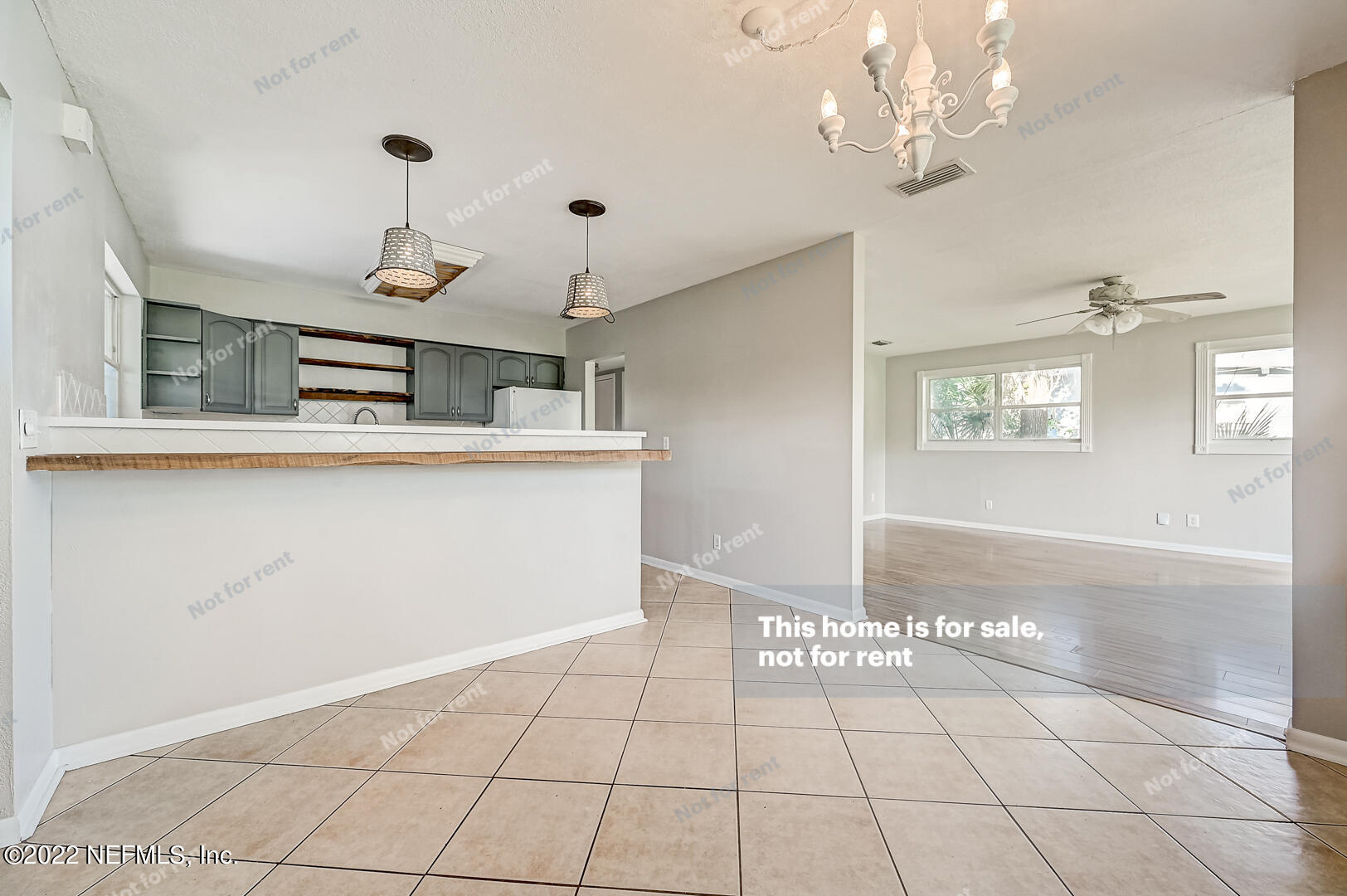 10918 Java Drive Jacksonville, FL 32246 - Photo 19 of 25 a view of a kitchen with windows and cabinet