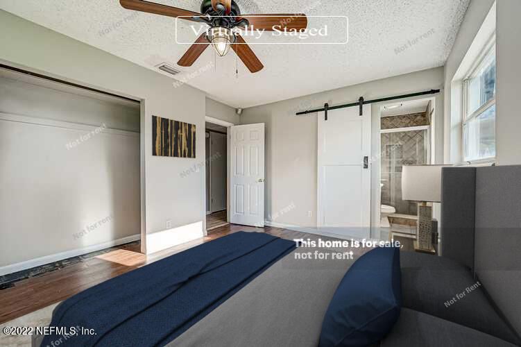 10918 Java Drive Jacksonville, FL 32246 - Photo 3 of 25 a living room with furniture and a chandelier