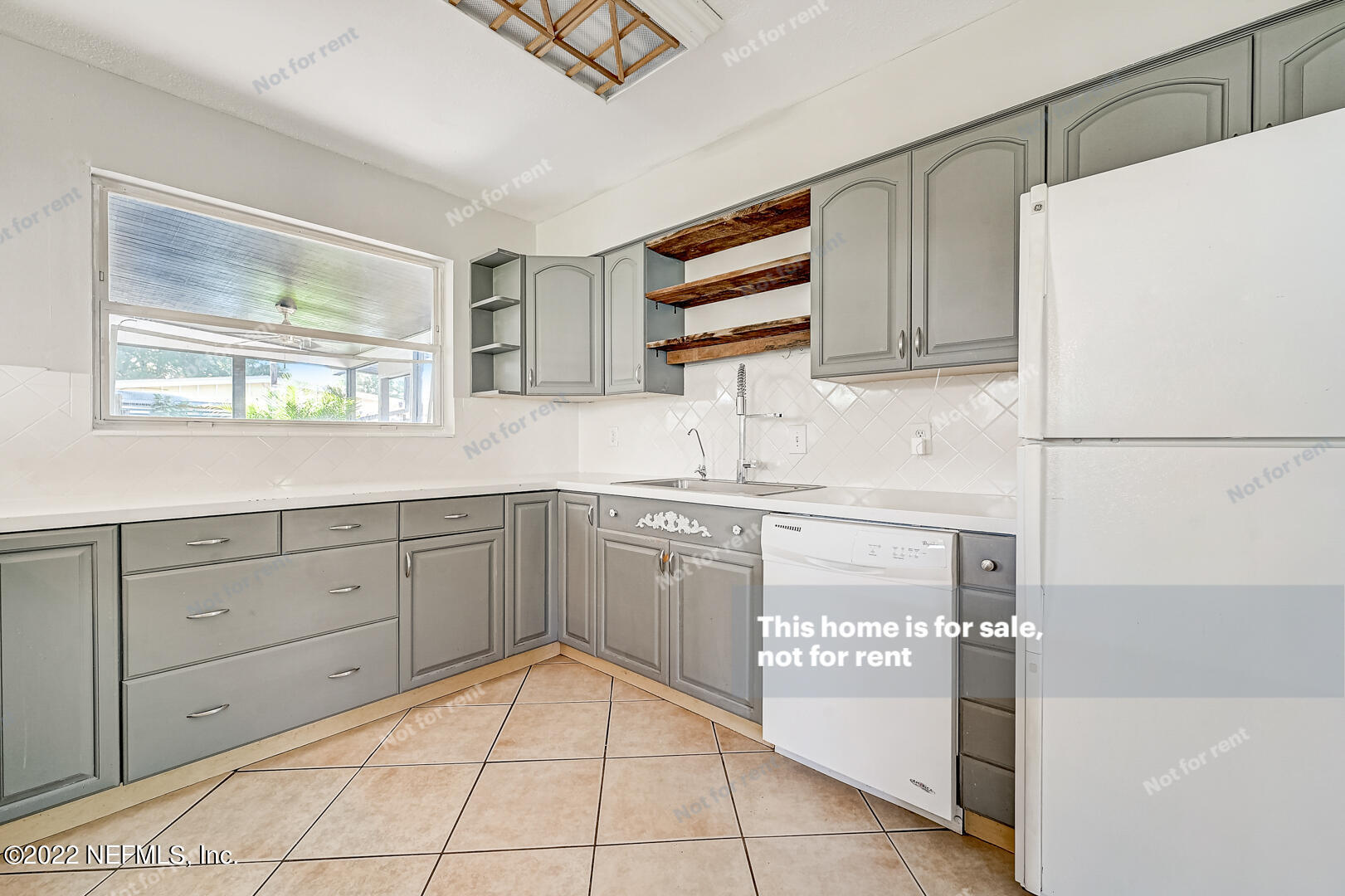 10918 Java Drive Jacksonville, FL 32246 - Photo 4 of 25 a kitchen with stainless steel appliances granite countertop a sink and cabinets