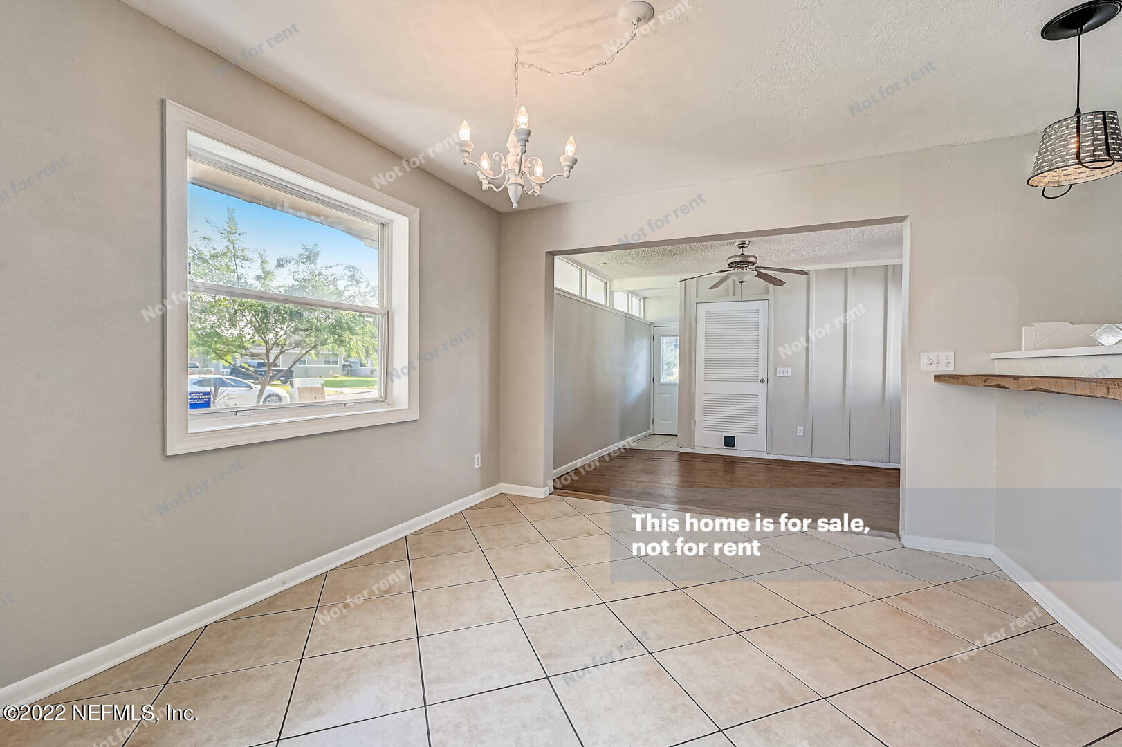 10918 Java Drive Jacksonville, FL 32246 - Photo 8 of 25 a view of an empty room with a window