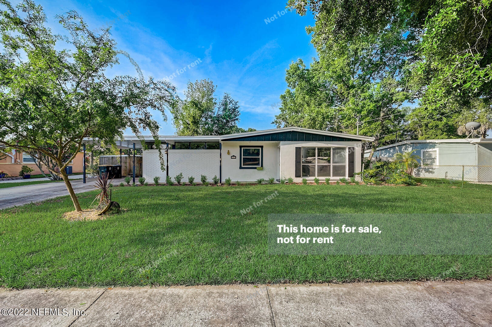 10918 Java Drive Jacksonville, FL 32246 - Photo 10 of 25 front view of a house with a yard