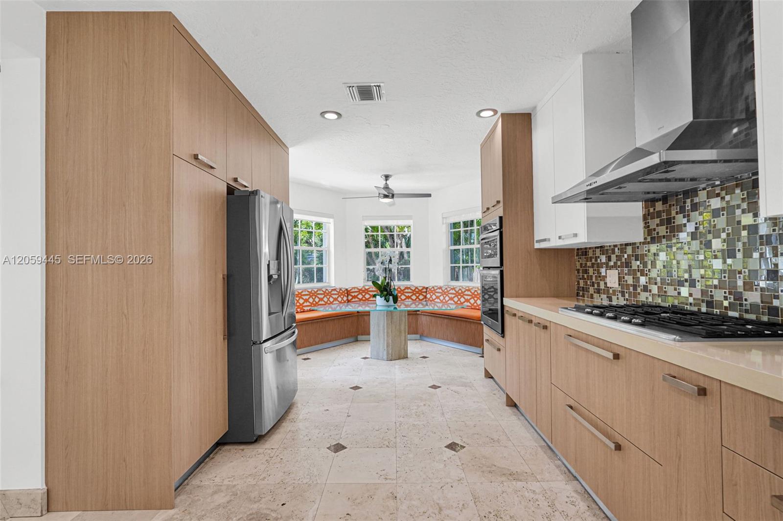 244 Southwest 28th Road Miami, FL 33129 - Photo 32 of 70 Chefs Dream Custom Kitchen | SS Appliances, Gas Cooktop, Breakfast Nook, Wine Cooler