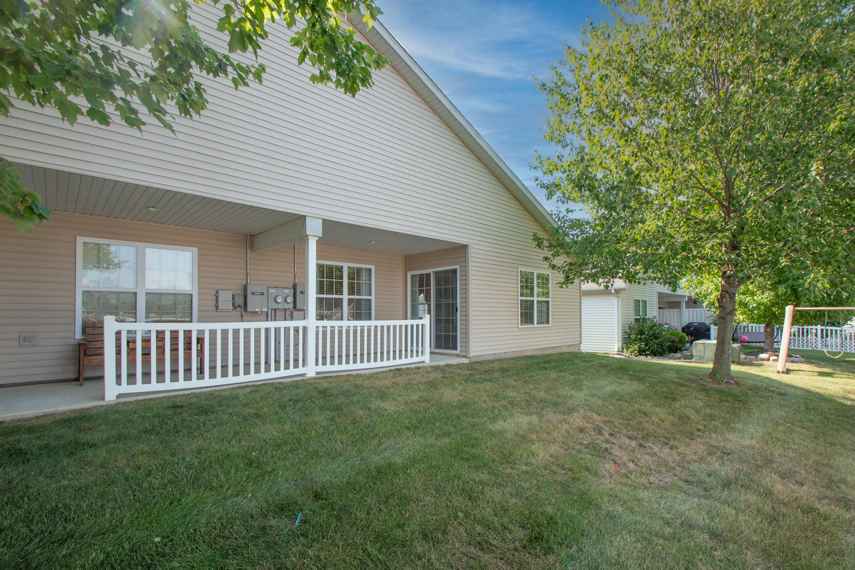 10677 Keystone Lane Crown Point, IN 46307 - Photo 27 of 33 a view of a house with a yard and deck